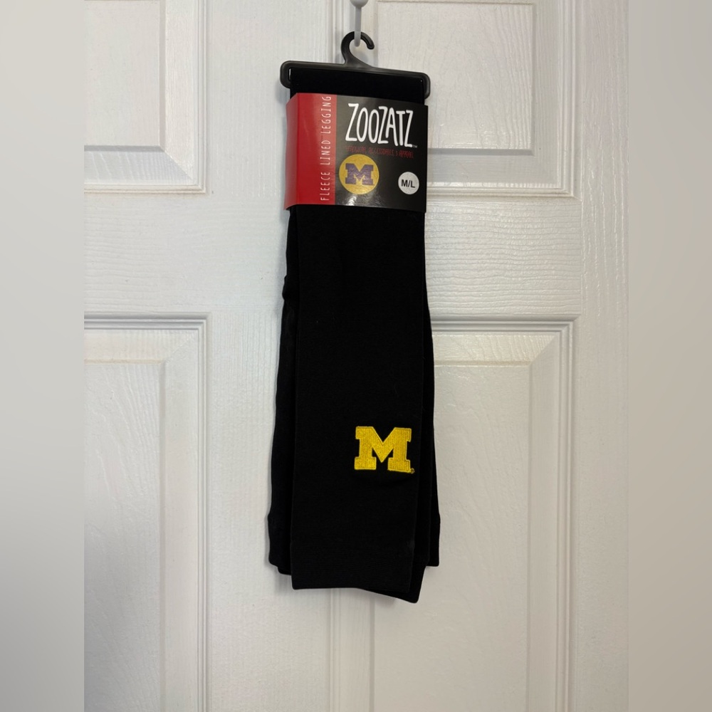 ZOOZATZ Women’s Black Leggings with Yellow 'M' Logo - M/L